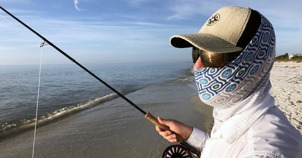 Scott wearing the first Happier Bandana and the Happier Place Burlap Trucker Hat while fly-fishing in Clearwater Beach, Florida.