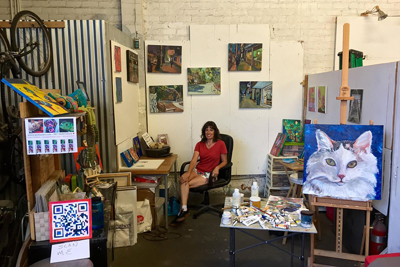 Lisa Goldfarb in her painting studio in California. Happier Place