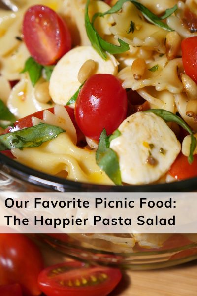 Happier Place favorite picnic food: Happier Pasta Salad recipe features tomatoes, mini mozzarella, sun-dried tomatoes and toasted pine nuts.