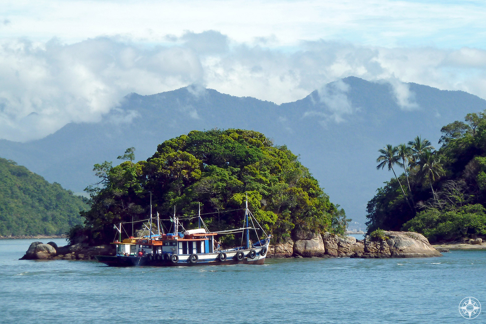 Fishing boats off Paradise island Ilha Grande in Brazil - Happier Place
