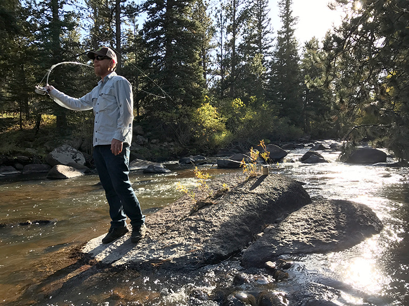 Scott Solary fly-fishing the North Fork of the Cache la Poudre River in Colorado.