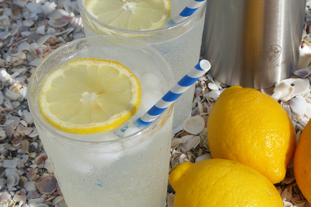 When life gives you lemons, make Vodka Collins recipe - Happier Place on the beach