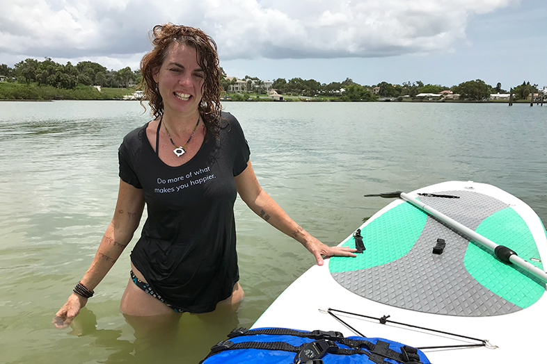 Margo and her SUP visiting the new Happier Place headquarters in Florida.