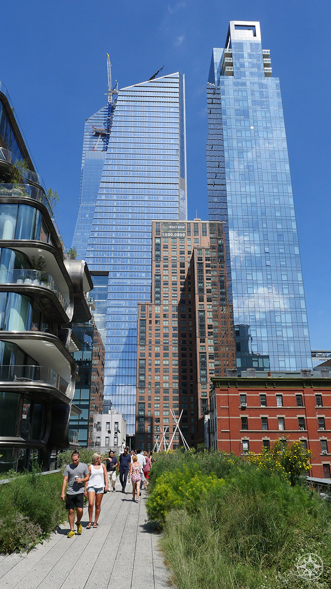 The high rises of the Hudson Yards are still under construction - but already loom tall over the High Line.