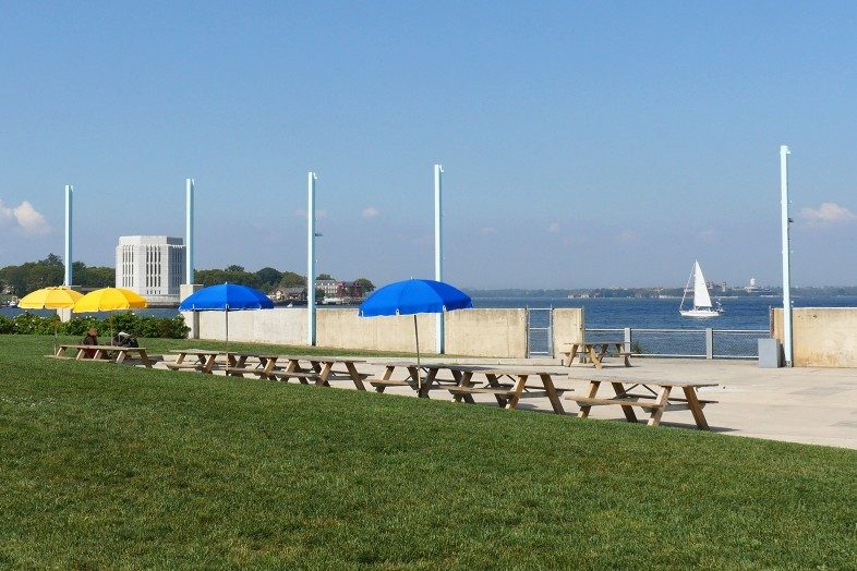 The Brooklyn park offers plenty of places to sit and relax while watching the boats go by on the East River.
