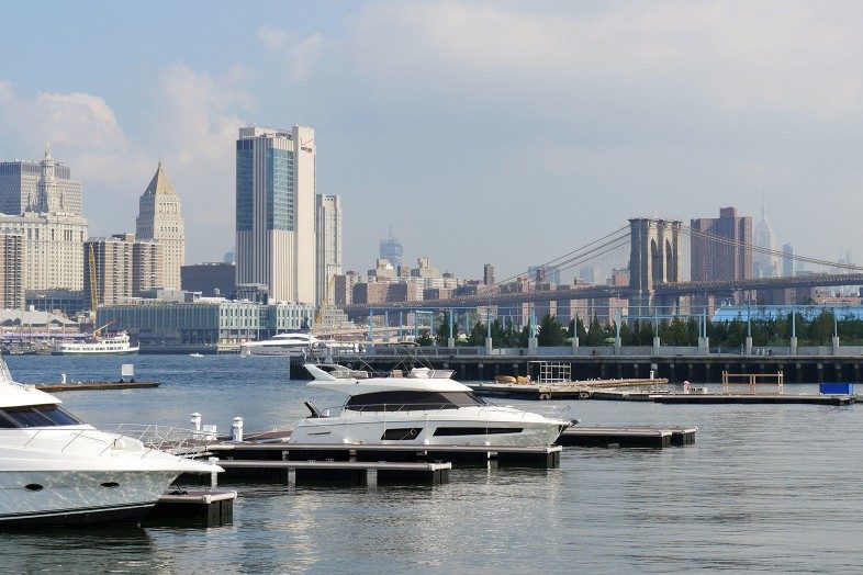 Not a bad place to dock your boat: the One 15 Brooklyn Marina on the East River with views of Manhattan, Pier 3, the Brooklyn Bridge and the Empire State Building in the back.