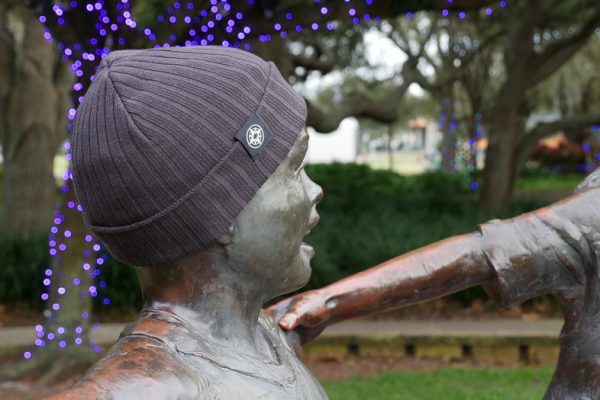 Happier Place Rib Classic Cuffed Beanie on child sculpture in Florida