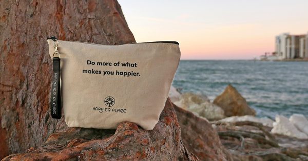 Do more of what makes you happier bag in Clearwater during sunset. Happier Place