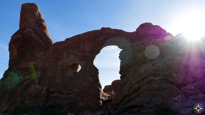 Turret Arch photographed against the sun.