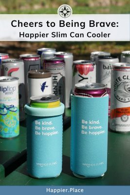 Cheers to being brave: the Happier Slim Can Cooler for cool drinks and for making the world a happier place.