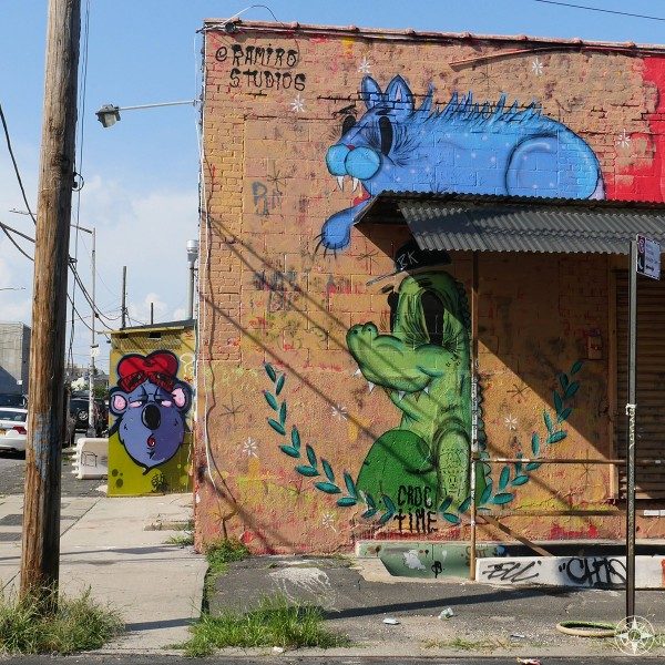 Blue Cat and Croc street art by Ramiro Studios (Ramiro Davaro-Comas) and a purple face down Waterbury Street, Brooklyn.
