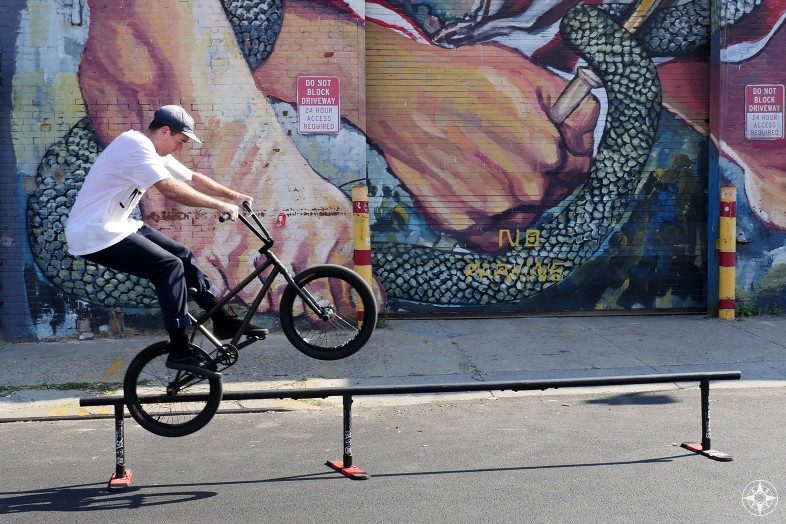 BMX bike snake hand mural Urban art by Ever Siempre Meserole