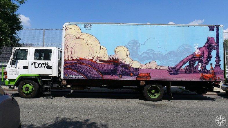 Sleeping reader and dragon urban art on truck by nubian art in Brooklyn NYC
