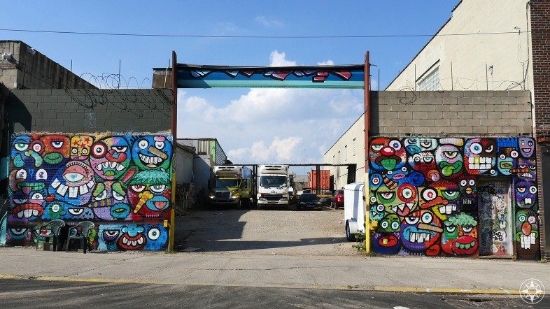 Colorful faces graffiti by Phetus Brooklyn street art