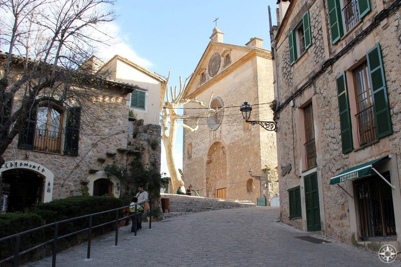 Historic buildings, churches and cobble stone streets in Valldemossa on the island Mallorca.