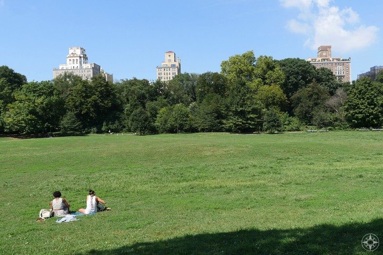 Two women are having a Happier Place in Prospect Park in Brooklyn, NY