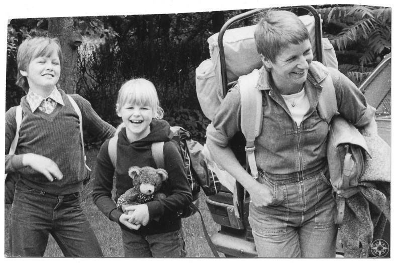 Take your kids outdoors - Happier Kids - Happier Place - Happier Family laughing backpacks