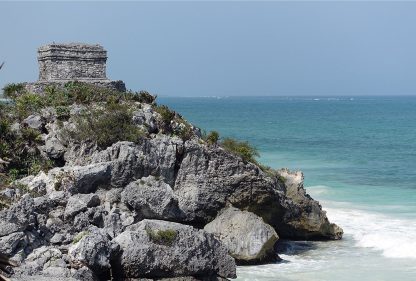 Maya temple on the rocky shore of Tulum, Mexico