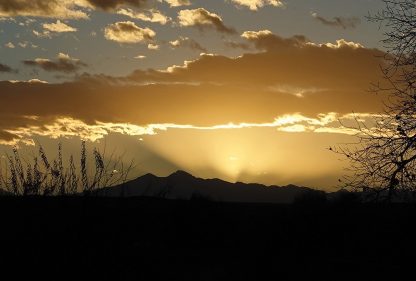 Sun rays behind the Rocky Mountains, Longs Peak, Meeker, Colorado, sunset sky postcards