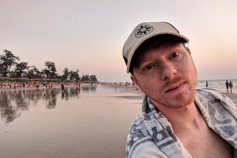 Happier Ambassador Adam, Goa, India, Happier Place burlap trucker hat, beach, Travels of Adam