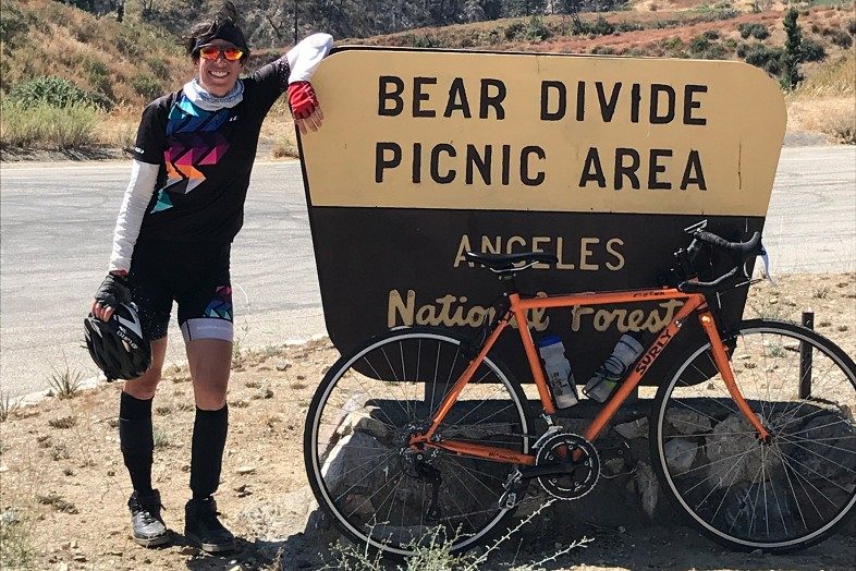 Happier Place ambassador Lisa and bike at Bear Divide Picnic Area in the Angeles National Forest