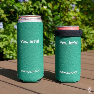 The Happier Place evergreen Yes, let's! Slim Can Cooler is perfectly sized for 12 oz and 9 oz slim cans. H023-CAN-YL-GRD