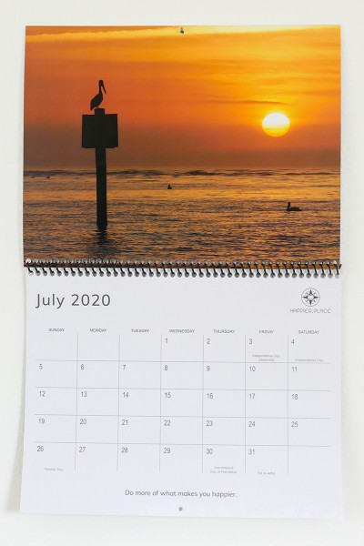 2020 Happier Place Calendar, nature photography, July page, pelican watches sunset, Florida