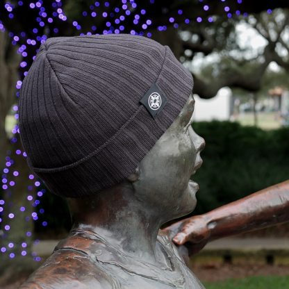 Happier Place, charcoal cuffed beanie on statue in Largo Park, Florida