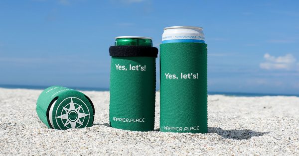 The Happier Place evergreen Yes, let's! Slim Can Cooler is perfectly sized for 12 oz and 9 oz slim cans.