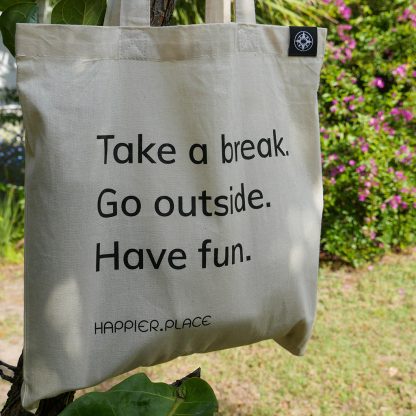 Take a break shoulder bag by Happier Place hanging outside