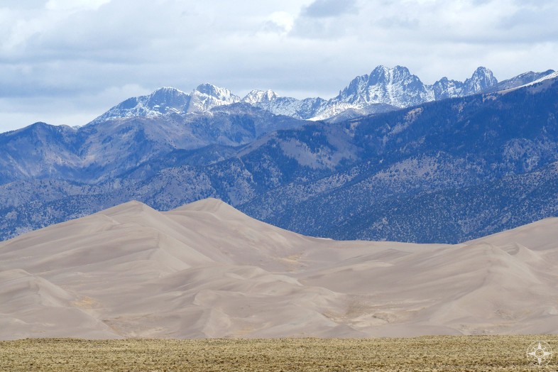 Great Sand Dunes National Park, Colorado, tall sand dunes and snow-peaked mountains