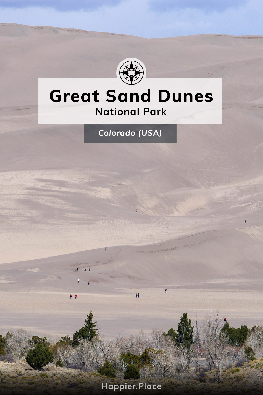 People hiking, sledding, snowboarding the Great Sand Dunes National Park Colorado Happier Place