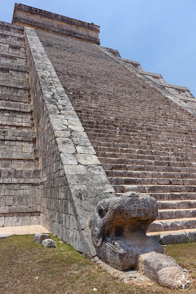 Left snake head on the north-east side of El Castillo pyramid, Chichen Itza, Mexico