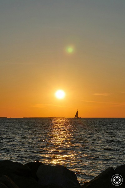 One more sunset with sailboat from the rock wall jetty in the Florida State Park on Key West.