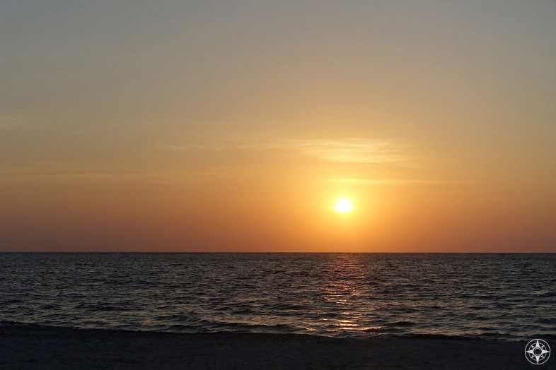 Sunrise over the Caribbean Sea viewed from the beach on Boca Paila in Sian Ka'an Bioreserve. 