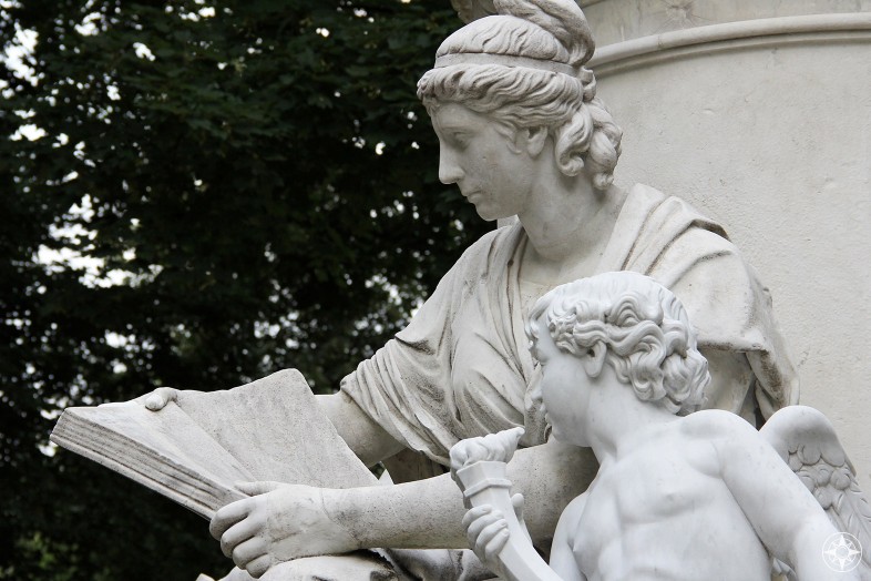 Statue of woman and child angel reading, honoring Goethe, Tiergarten, Berlin