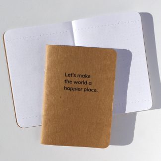 Let's make the world a happier place pocket-sized dot-grid Notebook by Happier Place made sustainably with recycled paper and plant-based ink.