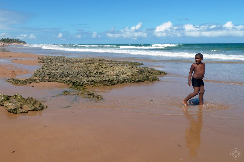 Black boy on the beach, reflection, Brazil