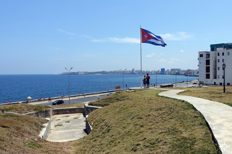 View of the Cuban flag, bunker entrance, the Malecón, and Bay of Havana from the famous Hotel Nacional