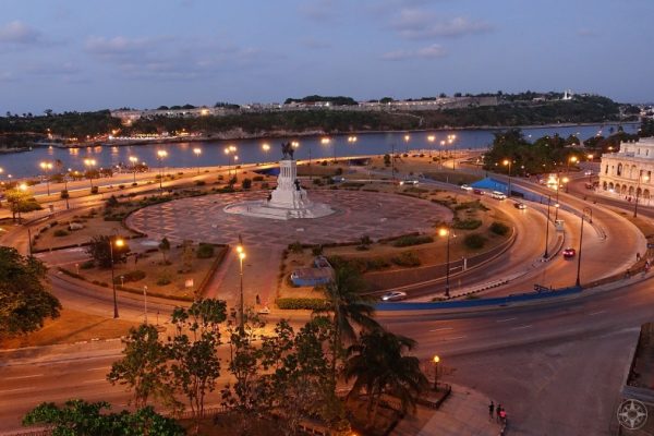 Evening at Parque Martires del 71 (Martyrs of '71 Park) and Maximo Gomez monument and entrance to the Havana Harbor, Cuba.
