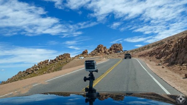 GoPro camera on car hood driving up mountain