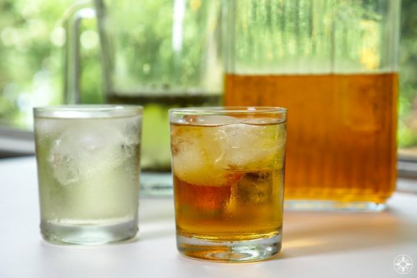 Green and black cold brew iced tea, recipe, glass, pitcher, outdoors
