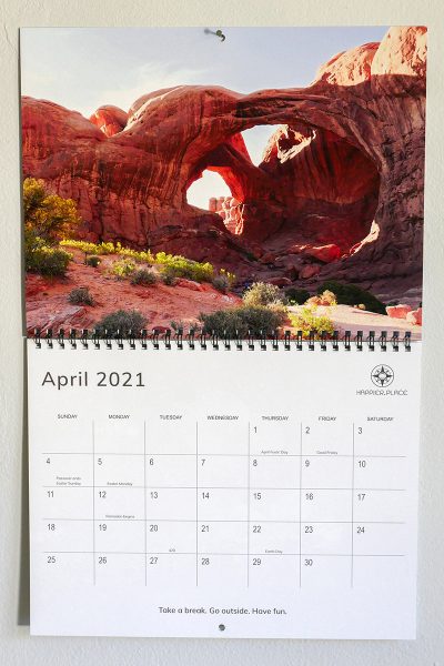 Double Arch in Arches National Park, Utah, April 2021 calendar page with holidays, inspirational quotes, Take a break. Go outside. Have fun.