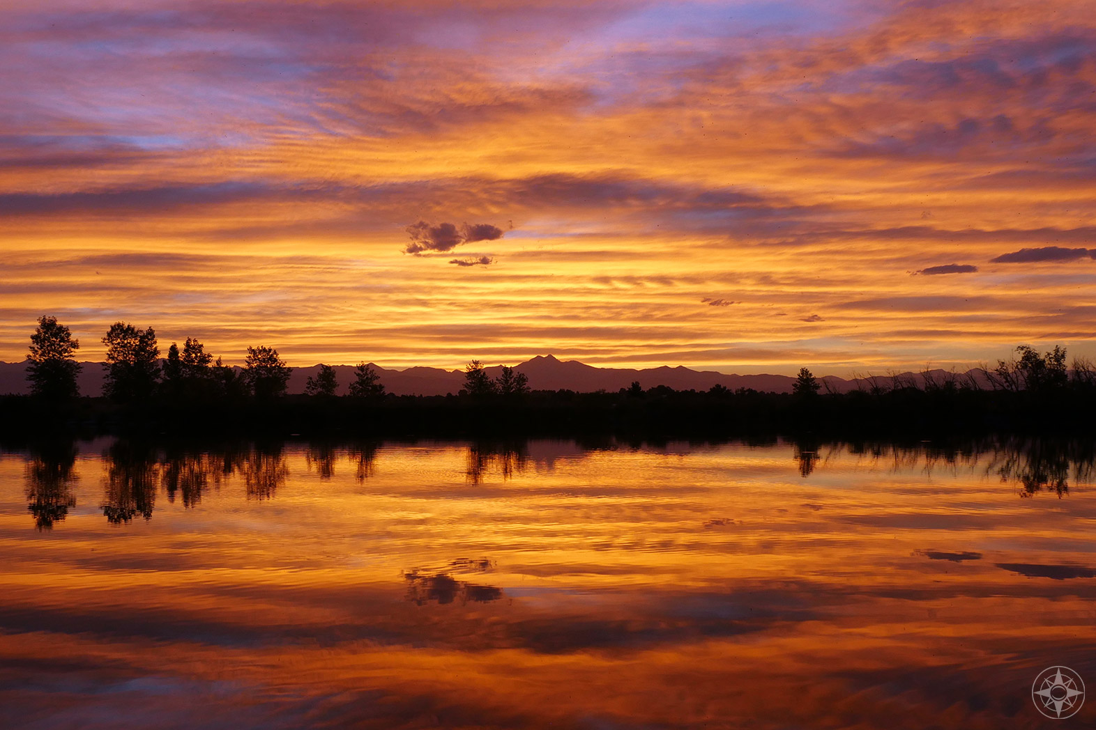 Rocky Mountain Sunset Reflection in Coot Pond in St. Vrain State Park, Colorado