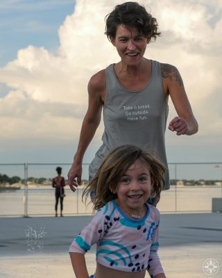Woman running with daughter having fun, St Pete Pier, Florida, Take a Break. Go outside. Have fun. first Happier Place Tank Top