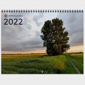 2022 Nature Photography Calendar by Happier Place, photographer Luci Westphal, tree on field in Schleswig-Holstein, Germany