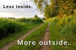 Less inside. More outside. trail between trees and fields during golden hour, Happier Place slogan to get happier and healthier,